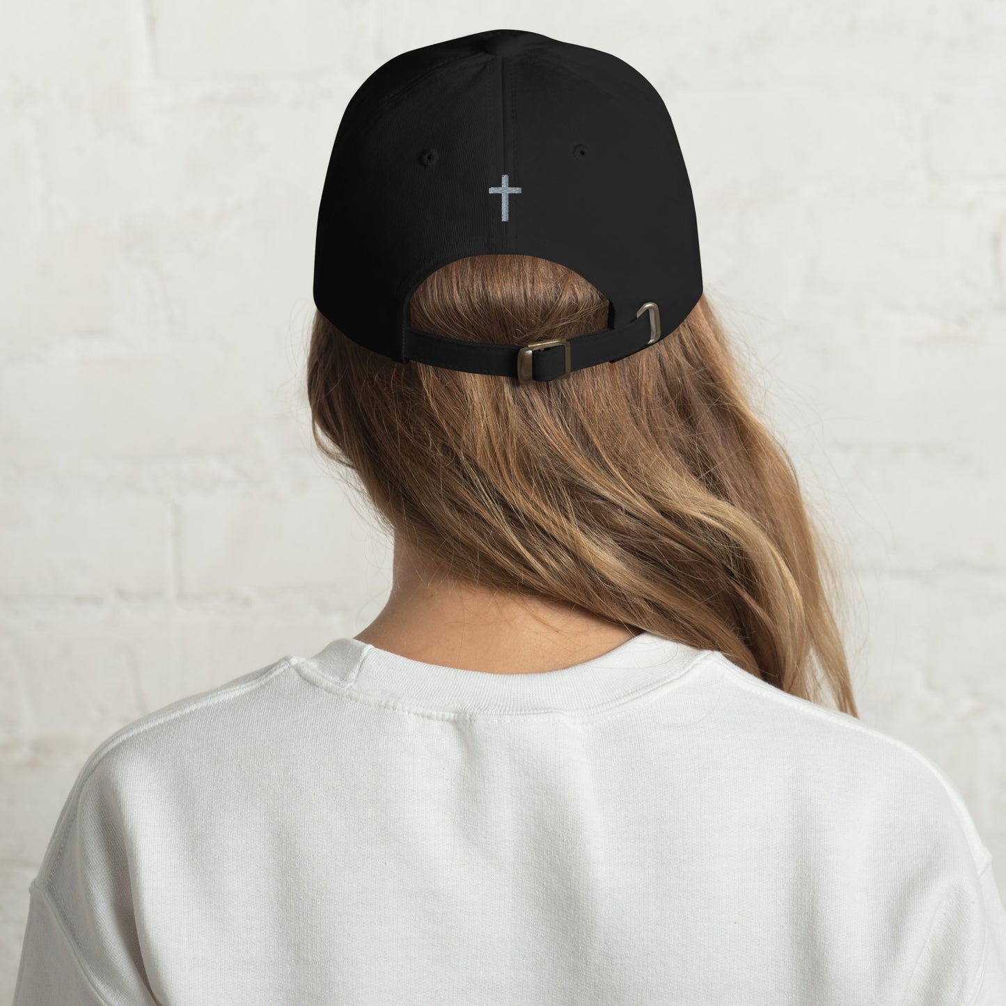 Cornerstone Wear black dad hat with embroidered logo, back view.