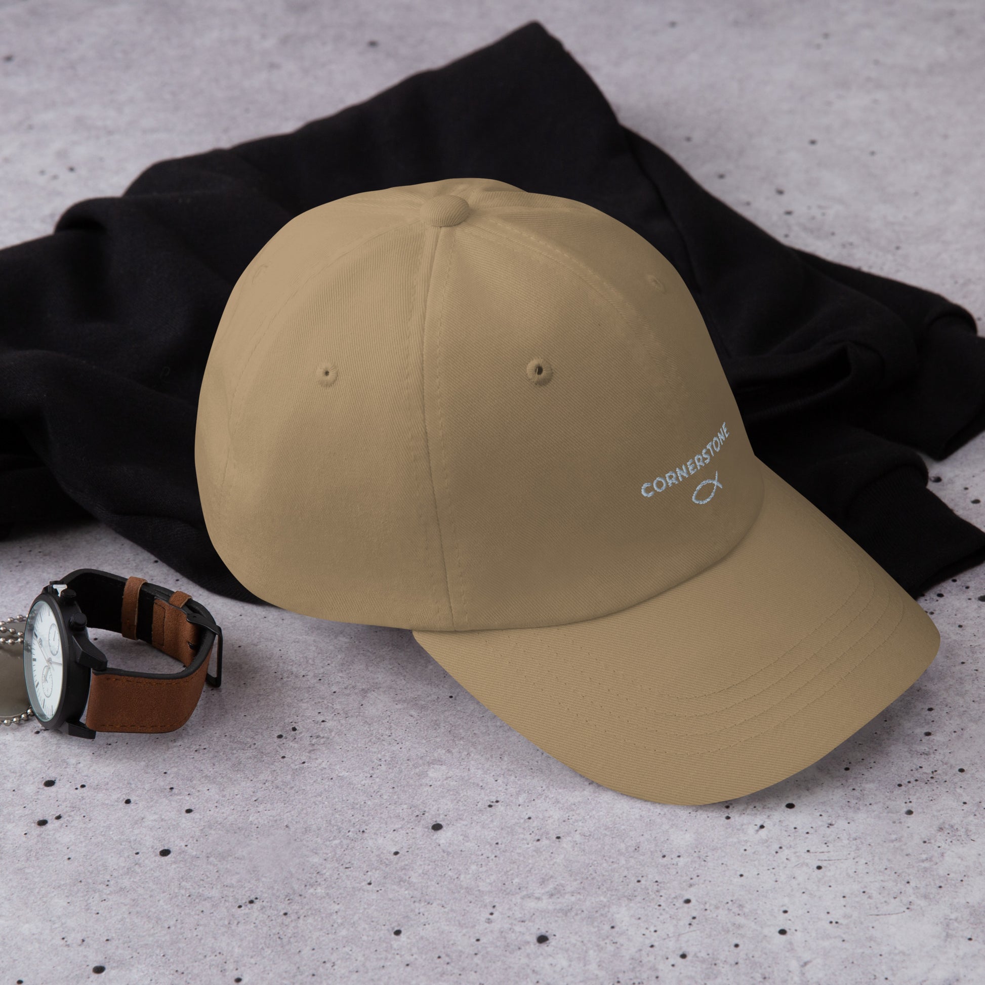 Cornerstone Wear khaki dad hat with embroidered logo, front side view.
