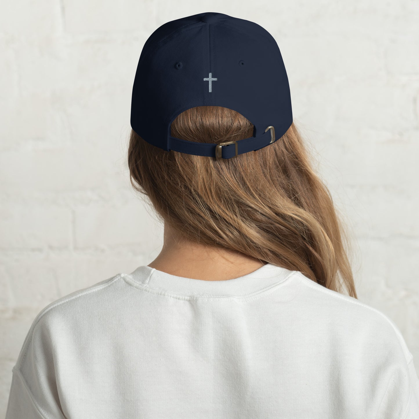 Cornerstone Wear navy dad hat with embroidered logo, back view.